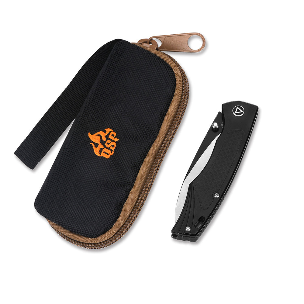 QSP Songbird pocket knife in a black case with a titanium handle visible