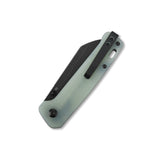 Closed QSP Penguin pocket knife with jade G10 handle and black D2 blade