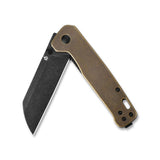 Side view of QSP Penguin pocket knife featuring D2 sheepsfoot blade and brass handle